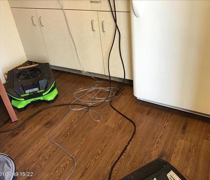 Break room with air movers on ground